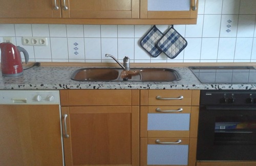 Hasselberg Apartment | Apartment field view between the Baltic Sea and Schlei with winter garden