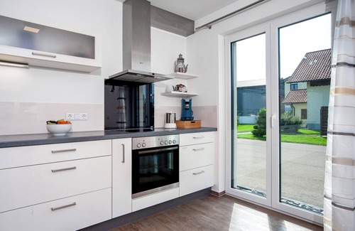 Wuchzenhofen Apartment | Apartment 'Im Allgäu - Biber 1' with Private Terrace, Shared Garden and Wi-Fi