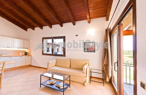 Porto Pozzo Apartment | Apartment with terrace and sea view