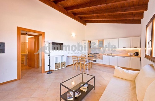 Porto Pozzo Apartment | Apartment with terrace and sea view