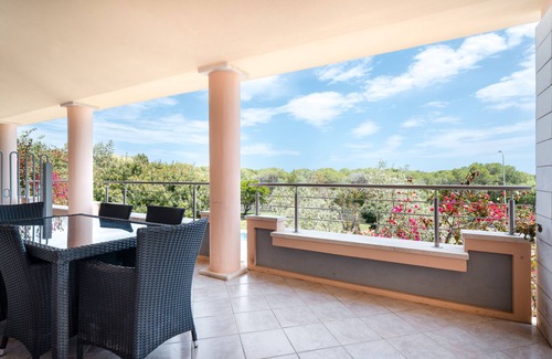 Sas Linnas Siccas Apartment | Apartment 'La Vela Blu' with Shared Pool, Wi-Fi and Air Conditioning