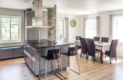 Strandebarm Apartment | Apartment located on the shore of Hardangerfjord with fantastic fjord view of Folgefonna glacier.