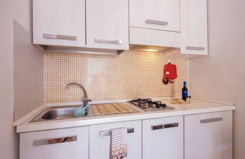 Borgagne Apartment | Apartment 'Mamba House 1' with Private Terrace, Shared Garden and Air Conditioning