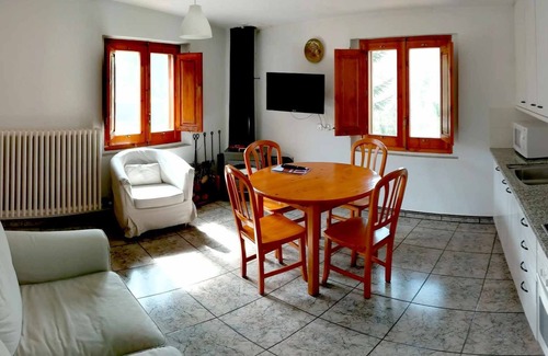 Santa Pau Apartment | Apartment 'Mas El Carrer - Blanc' with Shared Pool, Shared Garden and Wi-Fi