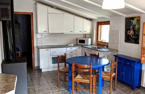 Santa Pau Apartment | Apartment 'Mas El Carrer - Blau' with Shared Pool, Shared Garden and Wi-Fi