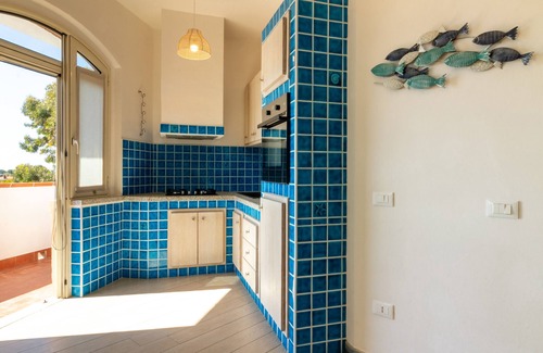 Su Forti House | Apartment 'Sa Domu Manna' with Sea View, Terrace, Shared Garden & Wi-Fi