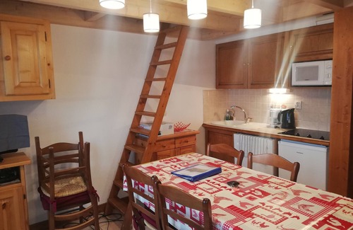 Praz-sur-Arly Apartment | Apartment with mezzanine near ski lifts and village center.