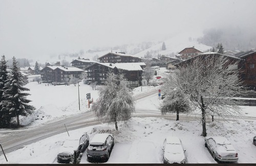 Praz-sur-Arly Apartment | Apartment with mezzanine near ski lifts and village center.