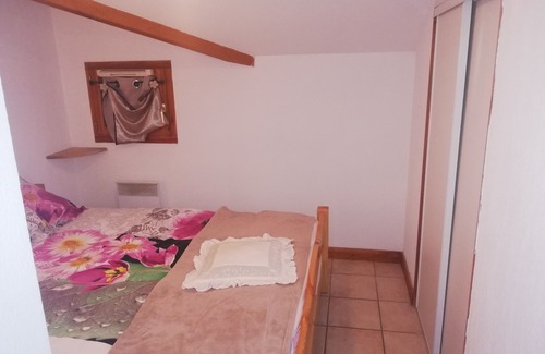Praz-sur-Arly Apartment | Apartment with mezzanine near ski lifts and village center.