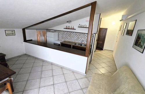 Biancareddu Apartment | Attic family apartment surrounded by nature, 2 minutes from the sea.