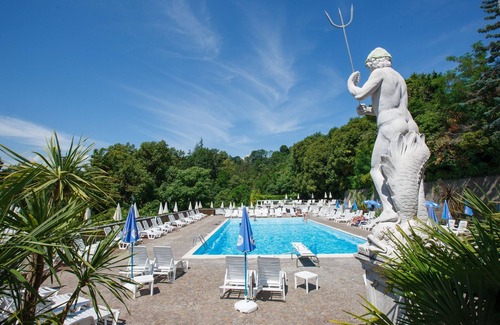 Susello Apartment | Attractive studio with terrace, garden, air conditioning, pool and dream lake view