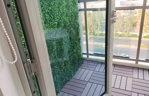 Bacolor Condo | Azure North Condo: Balcony & Scenic Views