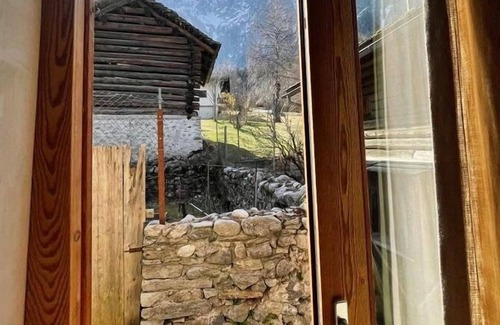 Bregaglia House | Barn1686 is located in the quiet village of Borgonovo, surrounded by nature and