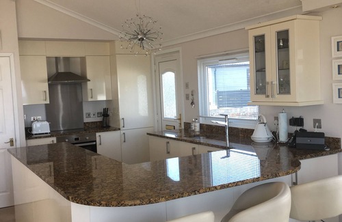 Mynytho Ski Chalet | Beach front chalet on the exclusive 5 star Warren Holiday Park