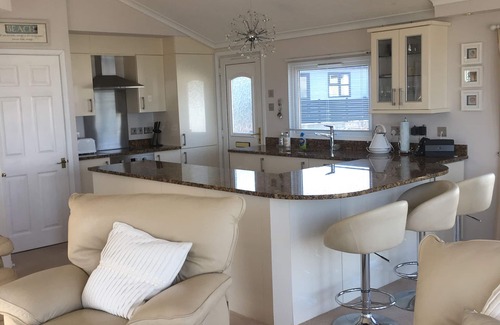 Mynytho Ski Chalet | Beach front chalet on the exclusive 5 star Warren Holiday Park