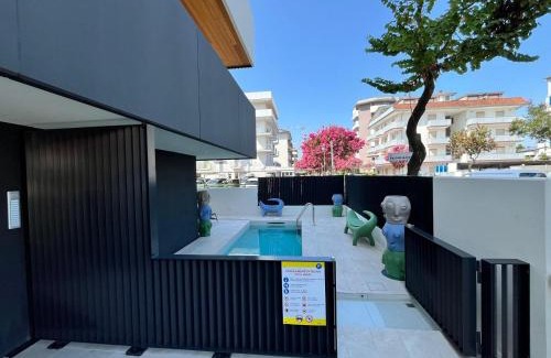 Jesolo Apartment | Beach Palace with small swimming pool, private beach, parking