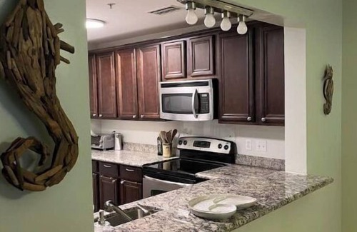 Henderson Point Condo | Beachfront Condo with Beautiful Sunset Views. Gorgeous Pool.