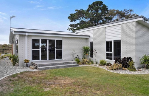 Lauderdale House | Beachfront Getaway with Modern Amenities & Comfort