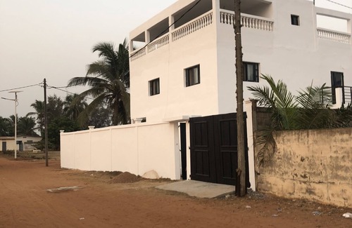 Aneho House | Beautiful 2 story beach house with an ocean view on the rooftop.