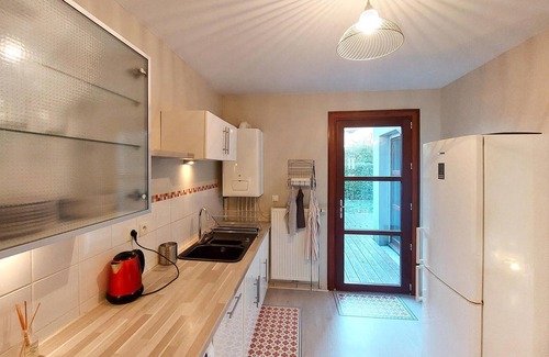 La Grand-Croix Apartment | Beautiful and modern apartment with a large window front.