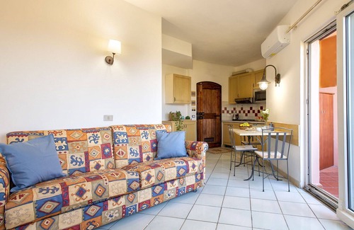 Canneddi Apartment | Beautiful apartment for 4 people with pool, WIFI, A/C, TV, terrace and pets allowed