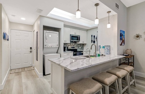 Bonita Bay Condo | Beautiful Bonita Bay Condo! Beach Shuttle, Pool, Kayaks, Tennis & Over $100 of Free Daily Activities