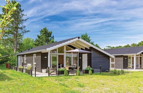 Nykøbing House | Beautiful cottage with kitchen open connection with dining and living room with an alcove.