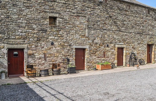 Maryport Cottage | Beautiful features with exposed stonework and beams.