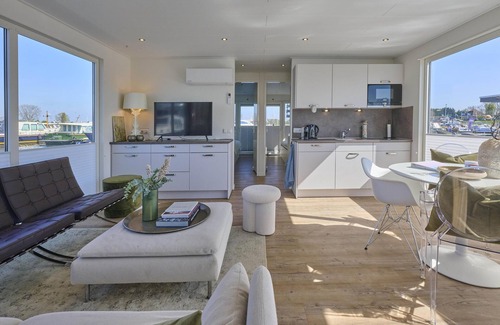 Kerkdriel Boat Rental | Beautiful houseboat in harbour of Kerkdriel