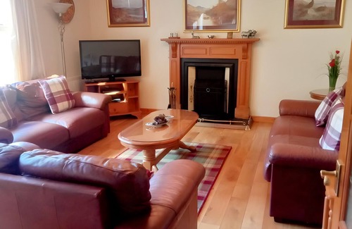 Dulnain Bridge House | Beautiful modern home with fantastic views over the pine forests onto the hills