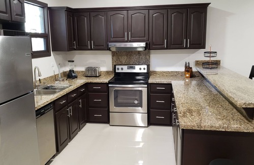 La Fortuna Condo | Beautiful New 2 Bedroom 3 Full Bath Condo with Attached Garage