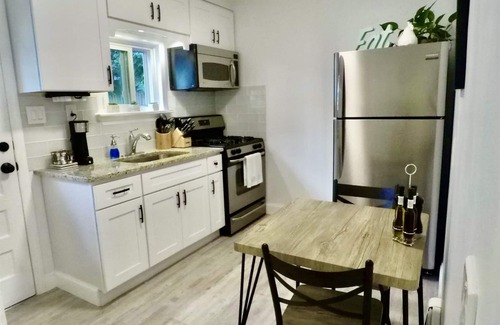 Islip Terrace Apartment | Beautifully decorated1BR Apartment - Full Kitchen, Private Backyard & Fire Pit!