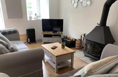 Josselin House | Beautifully restored cottage with swimming pool and hot tub with magnificent views