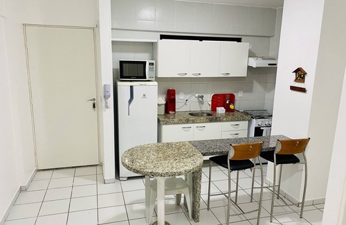 Ponta Verde Apartment | Bedroom and living room with pool near the beach