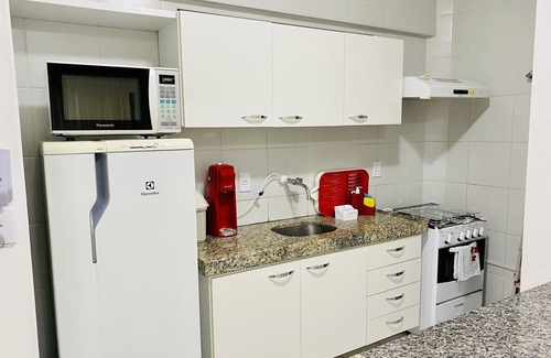 Ponta Verde Apartment | Bedroom and living room with pool near the beach