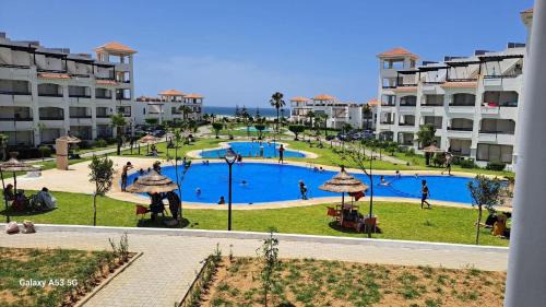 Asilah Beach Apartment | BERALMAR RESIDENCE Privée en terrasse rez-de-jardin pied dans l'eau Chez FAOUZIA