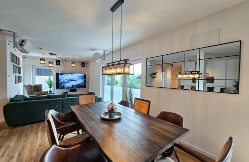 Altusried Apartment | BETTER l industriaI apartment l Heimkino