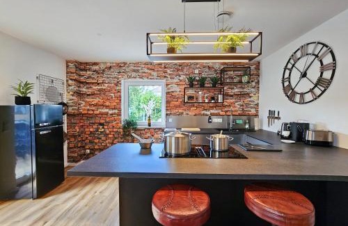 Altusried Apartment | BETTER l industriaI apartment l Heimkino