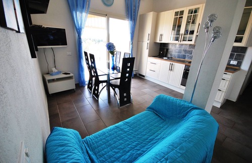 Orosei Apartment | Big terrace with BBQ and sight on Pool and exotic garden