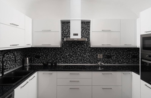 Karterados Villa | Black occhio villa Santorini