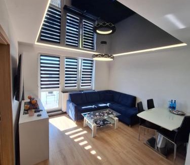 Plock Apartment | Black onyx