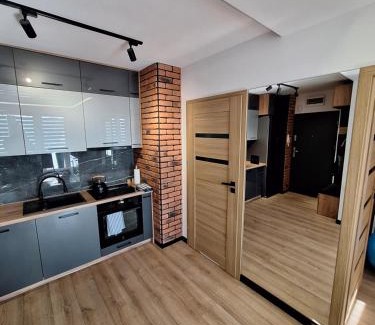 Plock Apartment | Black onyx