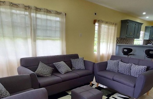 Buccoo Apartment | Blue Heron Place: Large Home Style Rental Unit:5 Minute Drive To Popular Beaches