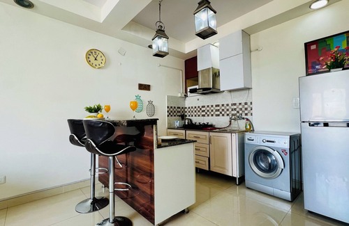 Defence Colony Apartment | BluO 1BHK Defence Colony Market - Lift, Balcony