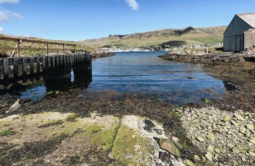 Oravik Apartment | Boathouse right by the fjord, with amazing views