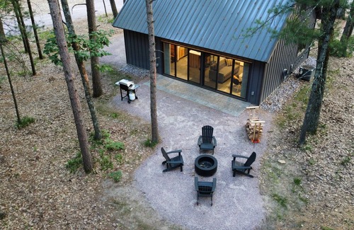 Wisconsin Dells Cabin | Bobcat Cabin @ Orange Tractor Retreat: a new, modern cabin on 40 private acres