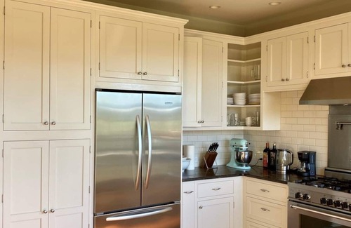 Lopez Island House | Bright art-filled home, fruit trees, valley view