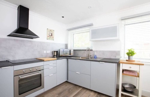 Selsey House | Bright & Modern Selsey Seafront Home