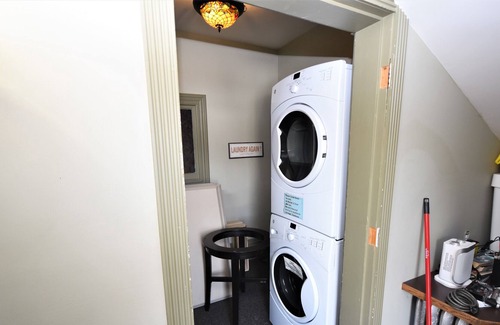 Vernon Apartment | Bright One Bedroom Suite Has Peaked Ceilings with Tons of Character