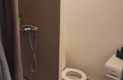 Belleville Apartment | Bright studio in the village of Jourdain, northeast of Paris.